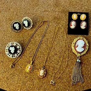 Lot of ladies estate sale vintage cameo jewelry, necklaces, earrings, and pins
